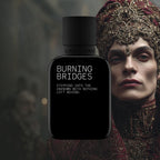 Perfume bottle labeled 'Burning Bridges' with a person in ornate clothing in the background